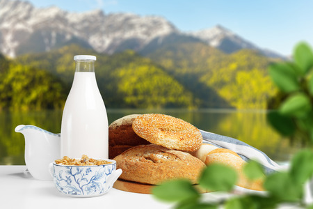 Bread and milk on the tableの写真素材