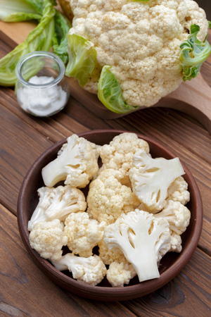 Organic cauliflower on wooden backgroundの写真素材