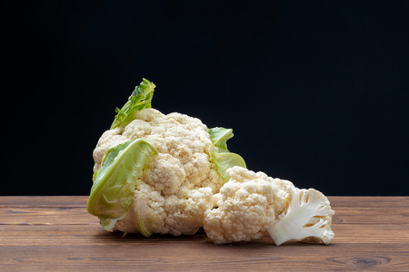 Organic cauliflower on wooden backgroundの写真素材