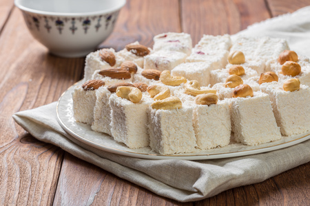 Turkish delight on a wooden table.の写真素材