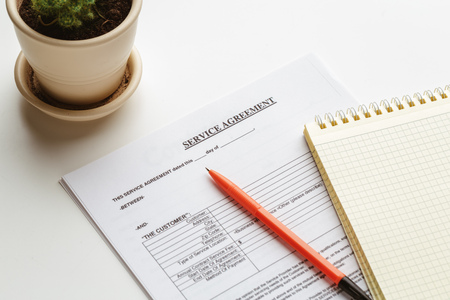 Legal contract signing - buy sell real estate contract