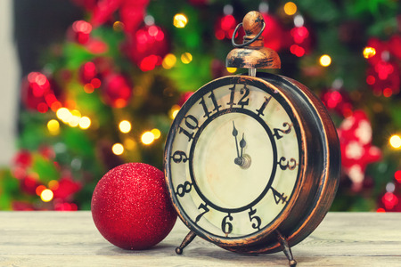 Composition with retro alarm clock and Christmas decoration
