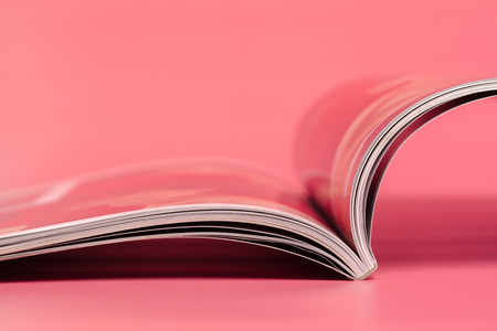 Magazines on a pinkの写真素材