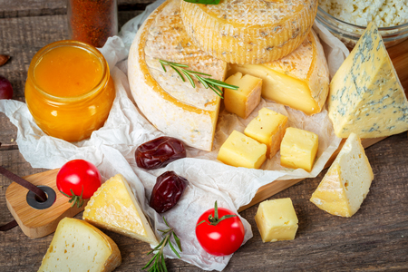 cheese on wooden tableの写真素材