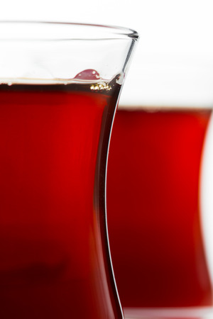 Turkish tea in traditional glass isolated on white backgroundの写真素材