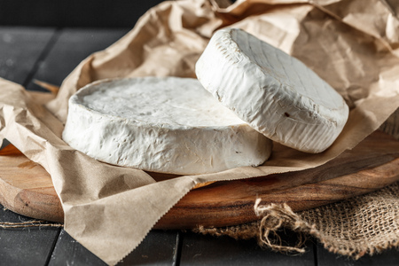 Cheese on the wooden tableの写真素材