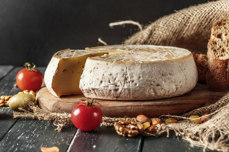 Cheese on the wooden tableの写真素材