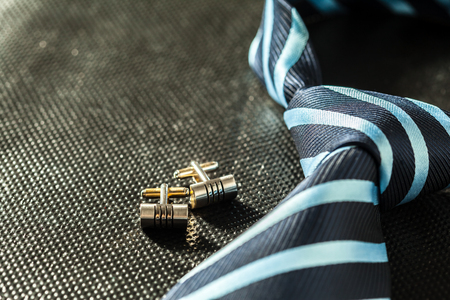 tie on dark backgroundの写真素材