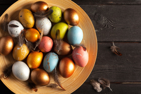 Happy easter! Easter eggs on wooden backgroundの写真素材