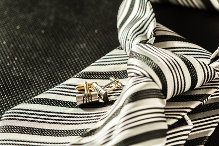 tie on dark background