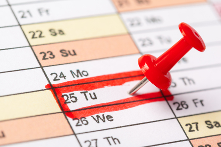 Closeup of dates on calendar pageの写真素材