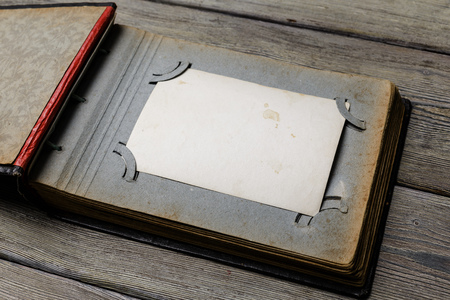 retro some old photos on wooden tableの写真素材