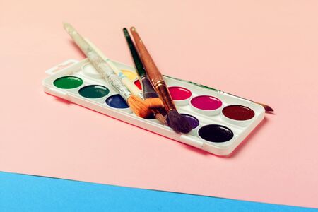 Top view of Work Process Blank Watercolor Paper Watercolor Painting Supplies Brushes. creative photoの写真素材