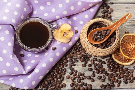 Cup Of Coffee And Coffee Beans On Table. Creative Photoの写真素材
