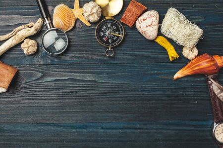 seashells and compass. beautiful sea composition with shells and vintage compass. creative photo.の写真素材