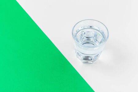 glasses of water on a color backgroundの写真素材