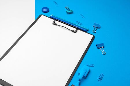 Clipboard mock up on vibrant duotone blue and white backgroundの写真素材