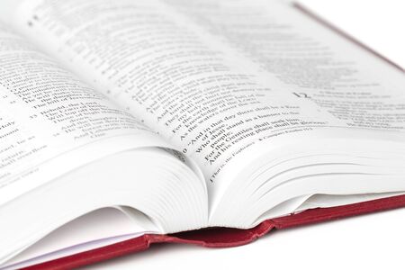 Holy Bible book, isolated on white. creative photo.の写真素材