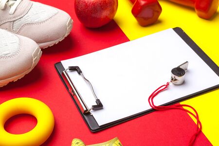 Fitness Gym equipment on color background