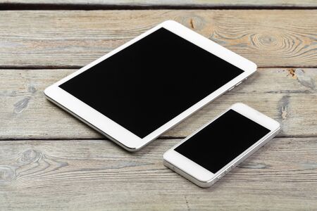 digital tablet and smartphone on the table