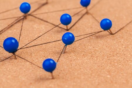 pins connected creating a networkの写真素材