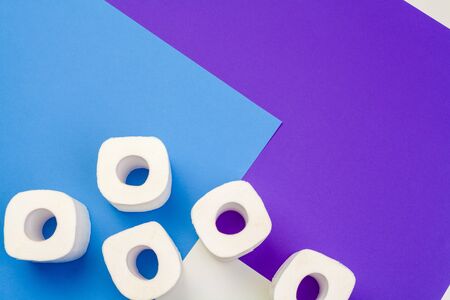 Rolls of toilet paper on color background, top viewの写真素材