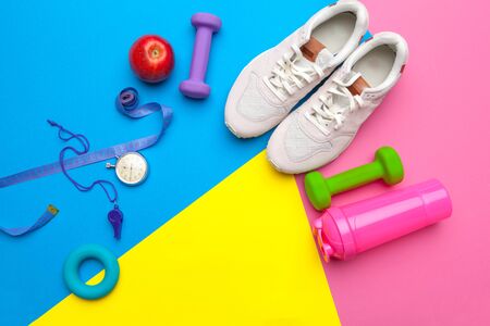 Fitness Gym equipment on color background. creative photo.の写真素材