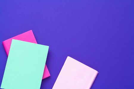 books on a blue background. creative photo.