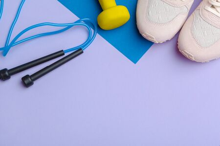 Fitness Gym equipment on color background