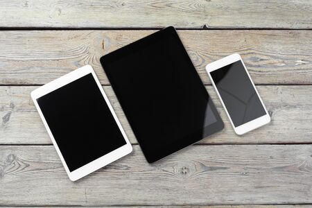 digital tablet and smartphone on the table. Creative photo.