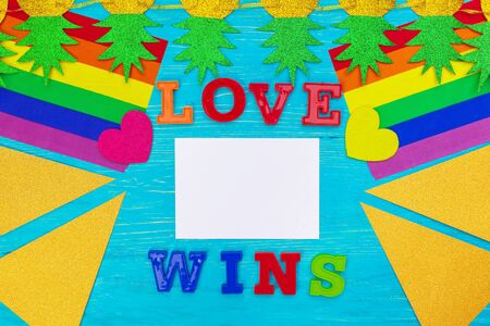 Gay pride flag on wooden table. creative photo.の写真素材