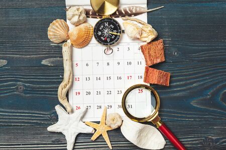 seashells and compass. beautiful sea composition with shells and vintage compassの写真素材