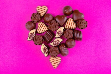 Chocolate candies heart. creative photo.の写真素材
