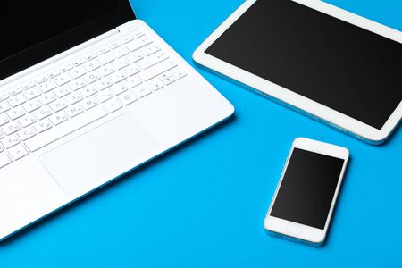 Open laptop with digital tablet on the table. creative photo.の写真素材