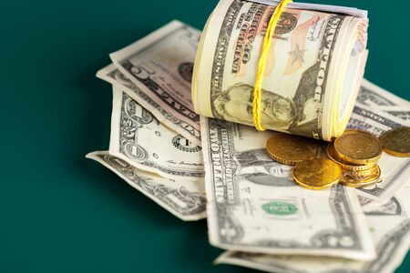 US dollar bills and coins. creative photo.