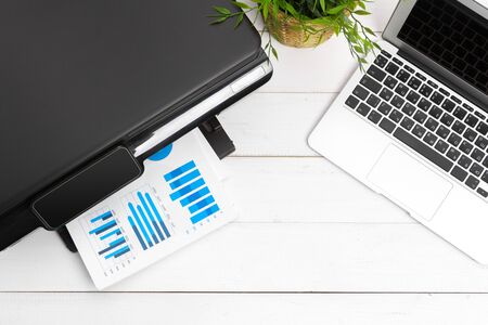 Working place of a business person. printer and other office supplies. creative photo.