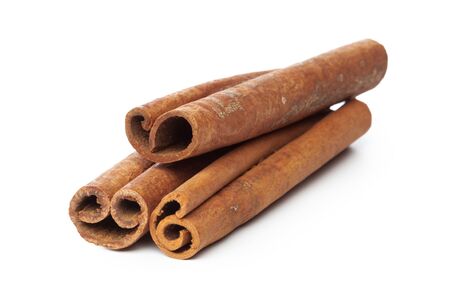 Cinnamon sticks isolated on white backgroundの写真素材