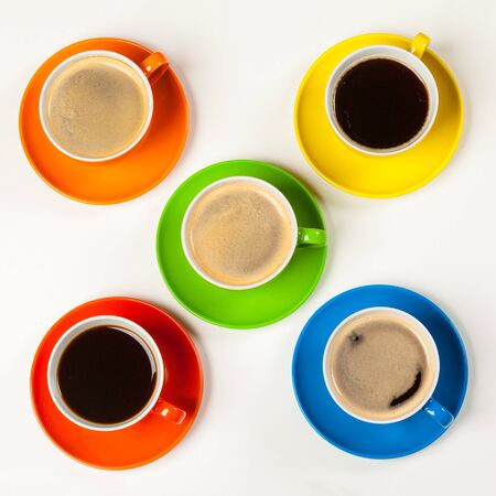 Coffee time. Bright colored composition of coffee cups. creative photo.の写真素材