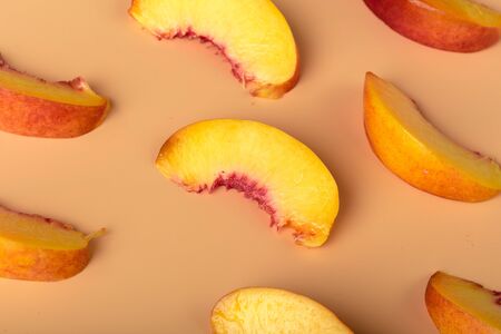 Ripe peach fruit slice. creative photo.