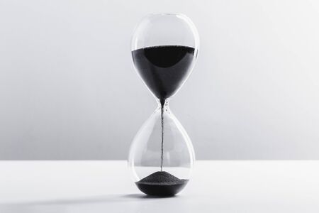 Close up hourglass on table