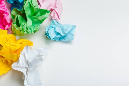 crumpled paper on white table brainstorming in the office concept creative photo.の写真素材