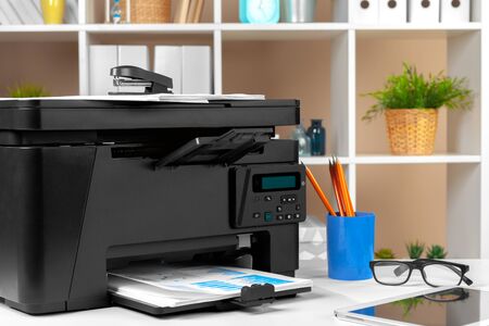 Printer copier scanner in office. Workplace.
