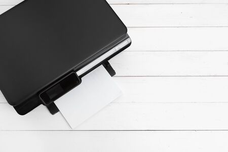 Working place of a business person. printer and other office supplies creative photo.