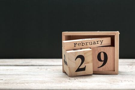 February 29th. Day 29 of february month, calendar on wooden background. Winter timeの写真素材