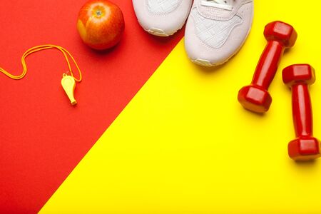 Fitness Gym equipment on color backgroundの写真素材