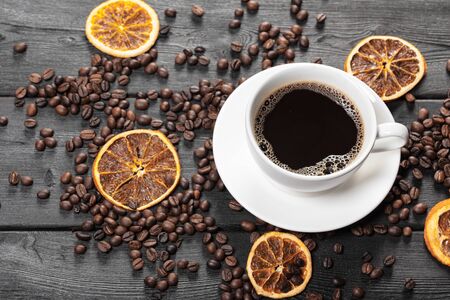 Cup Of Coffee And Coffee Beans On Table. creative photo.の写真素材