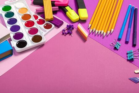 school supplies at abstract colorful background texture creative photo.