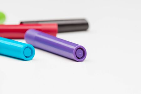 Colored markers isolated on white background