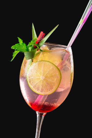 glass of delicious alcoholic cocktail on dark background