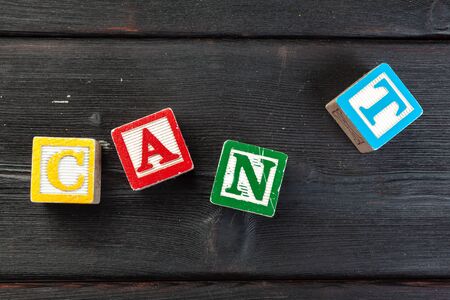 Can't Word Written In Wooden Cube on wooden background. Close up.の写真素材